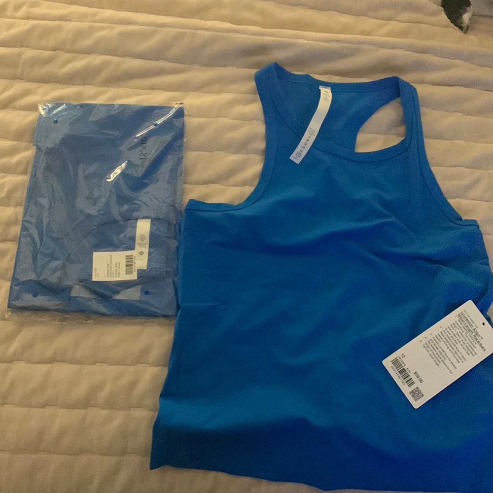 Lululemon align waist length racer back. Ordered 2 and can’t return.